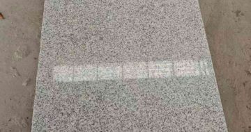 渭南芝麻白光面毛板