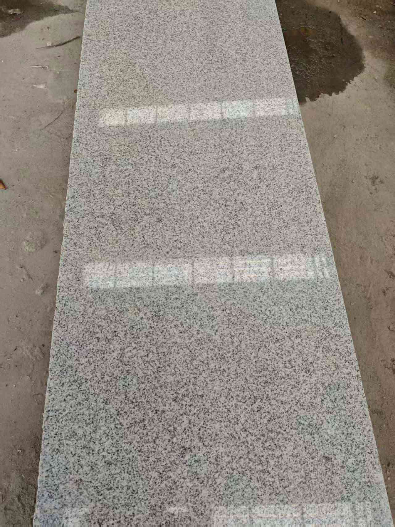 渭南芝麻白光面毛板